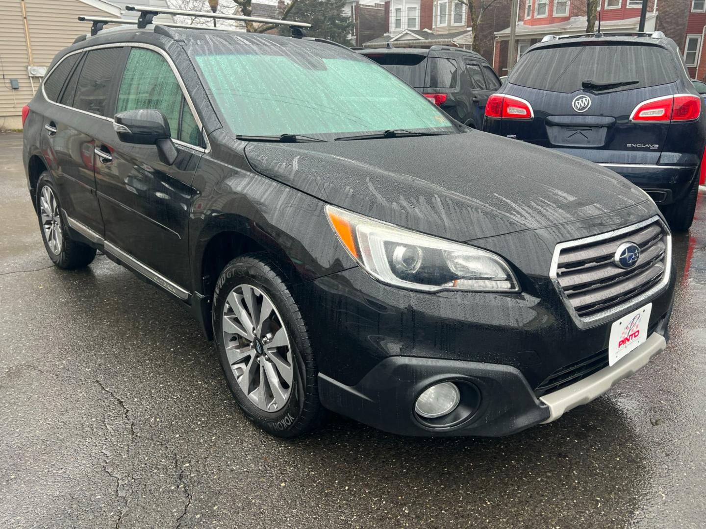 2017 BLACK /Brown Leather Subaru Outback 2.5i Touring (4S4BSETCXH3) with an 2.5L H4 DOHC 16V engine, 6A transmission, located at 1018 Brunswick Ave, Trenton, NJ, 08638, (609) 989-0900, 40.240086, -74.748085 - Photo#0